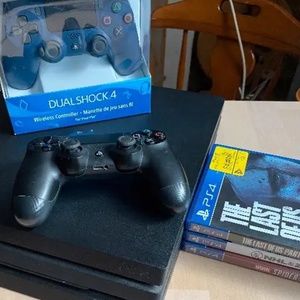 Playstation 4 1Tb with 2 controllers and games